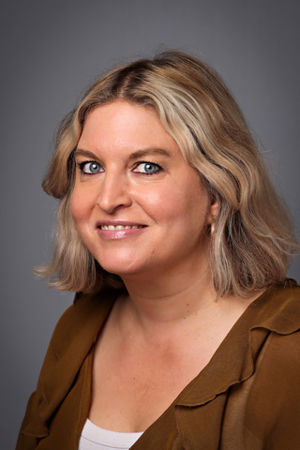 en person med blondt hår