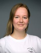en person som smiler til kameraet en person som smiler til kameraet